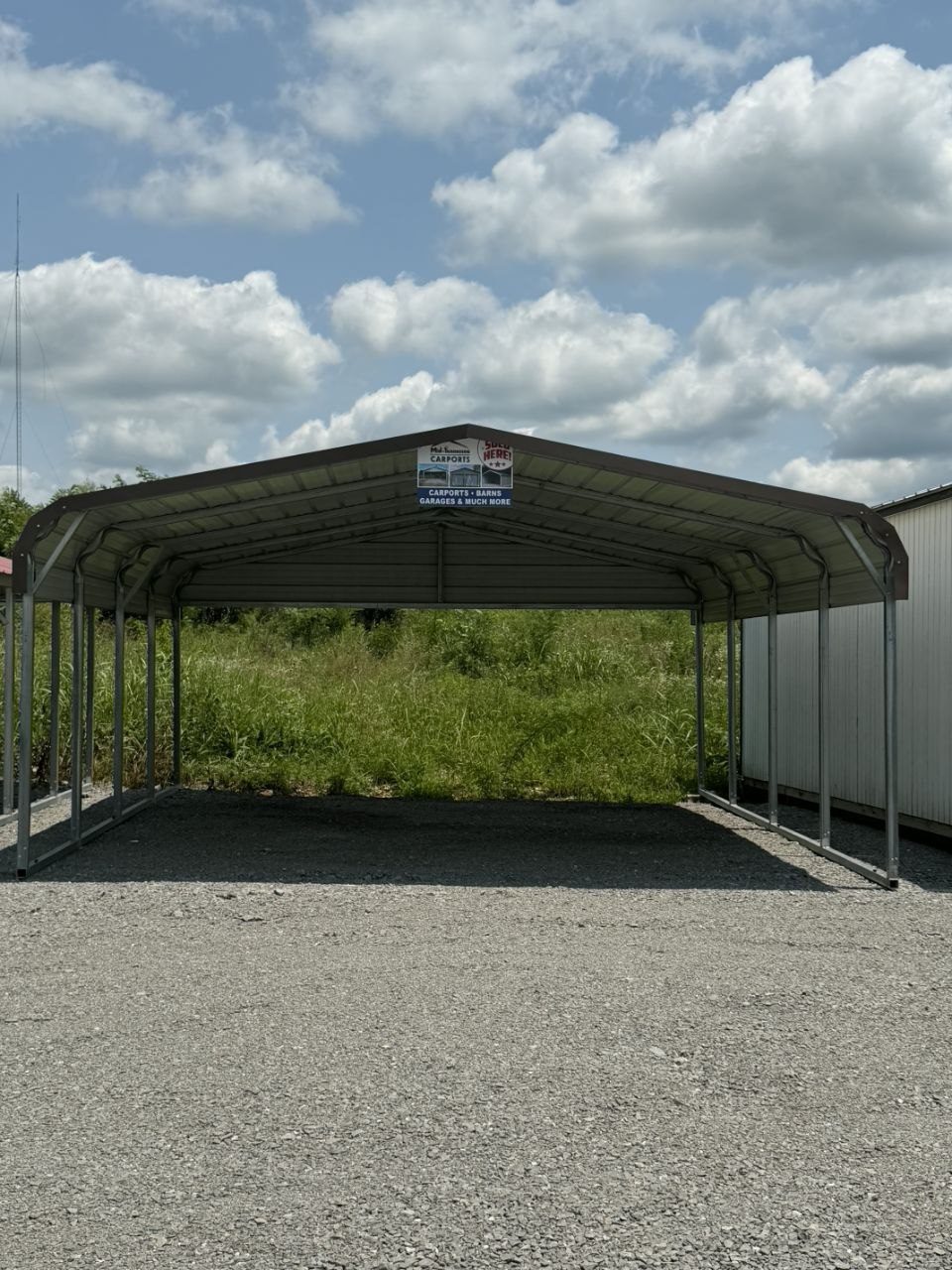 Current on-lot regular roof metal carport at Middle Tennessee Portable Buildings in Lewisburg Tennessee